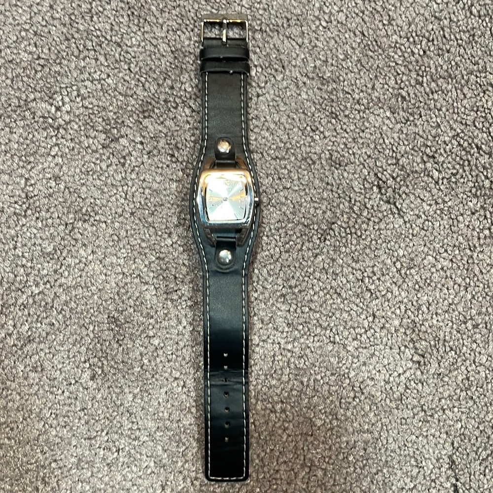 Black leather watch by XOXO.